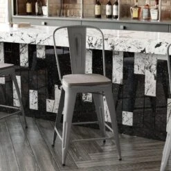 Emma And Oliver Clear Coated Metal Stool With Backrest And Polyresin Seat For Indoor Use Only -Furniture Shop GUEST 1aef0374 2485 45b1 a122 f268a39acd3d