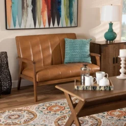 Nikko Mid-Century Faux Leather Upholstered Wood Loveseat Walnut/Brown - Baxton Studio 14 Nikko Mid-Century Faux Leather Upholstered Wood Loveseat Walnut/Brown - Baxton Studio -Furniture Shop GUEST d1496ae9 9e7b 4c99 a39c b224c1b080f8